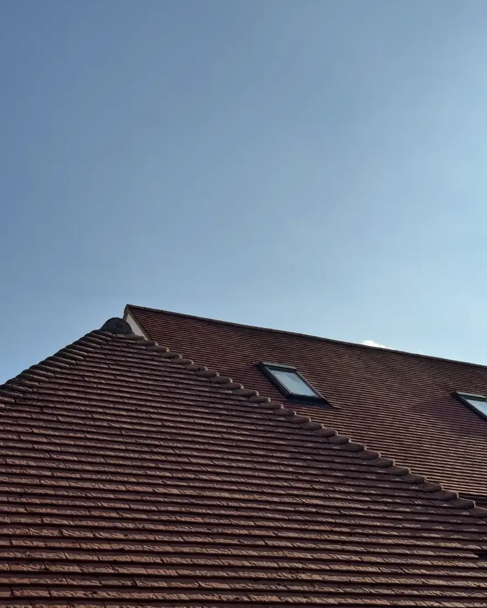 Clay tiled roof after cleaning, clear of moss and lichen