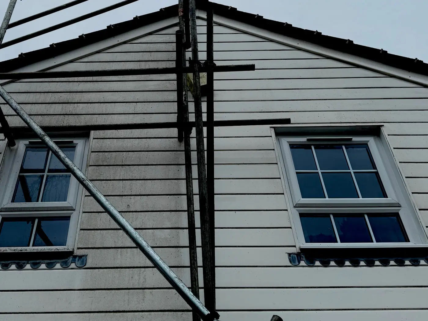 Cladding, fascia and soffit boards on a building elevation after cleaning
