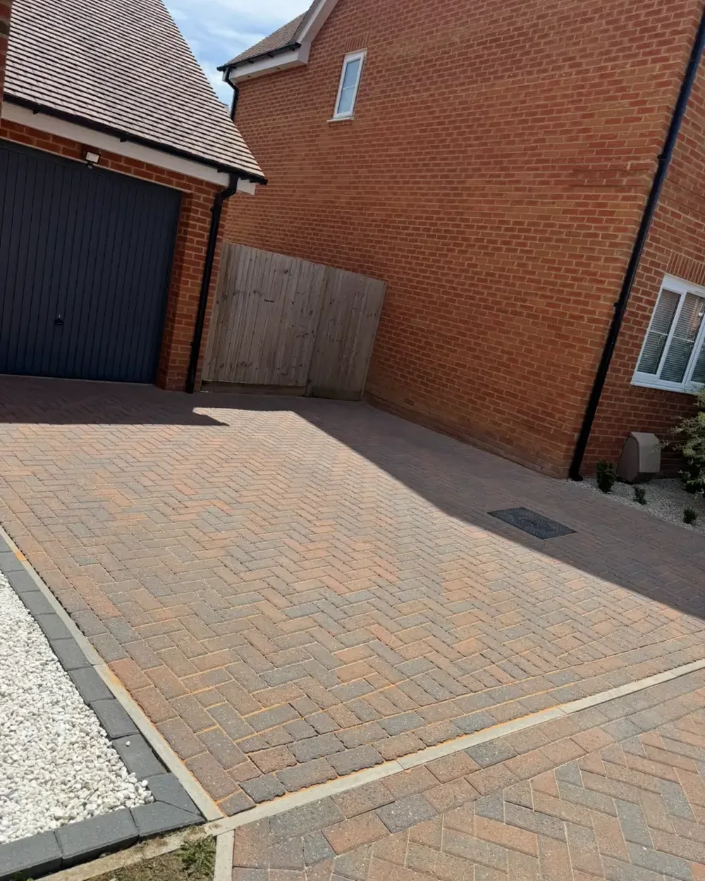 The same new build driveway cleaned and brought back to an even finish