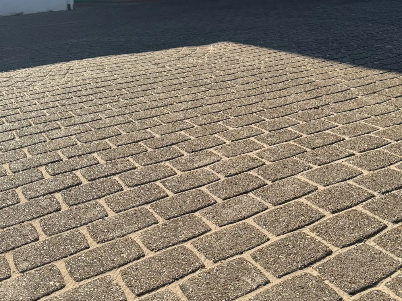 Concrete block driveway after professional pressure washing